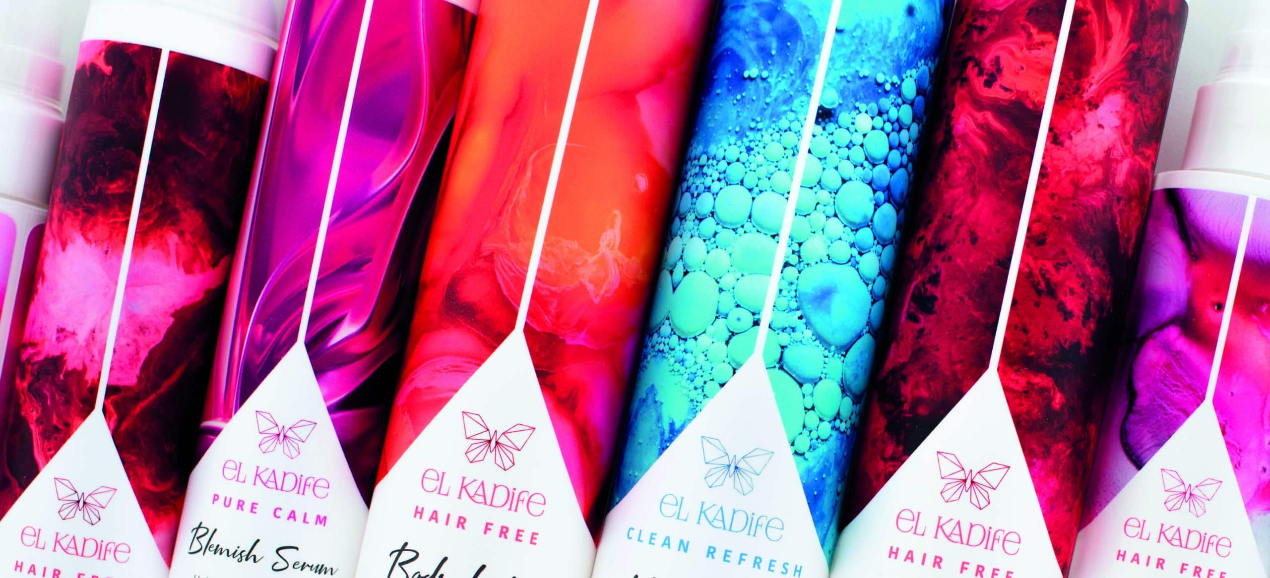 a group of colorful hair products